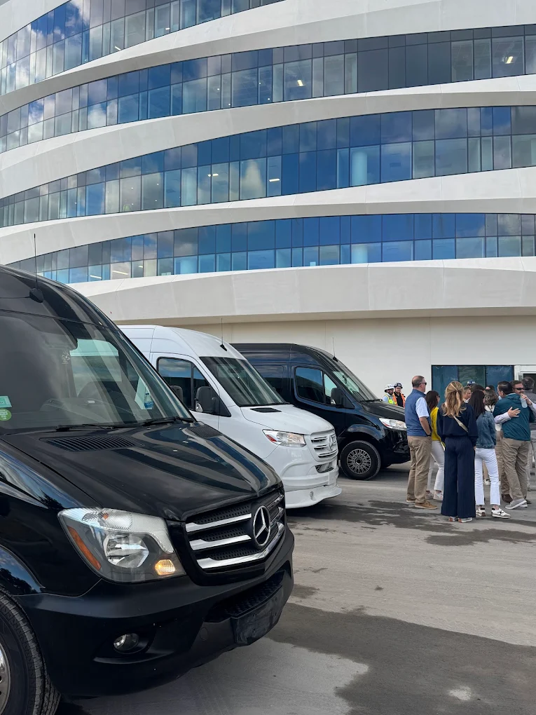 A group boarding an Aura Palm Sprinter for a Miami Open session day