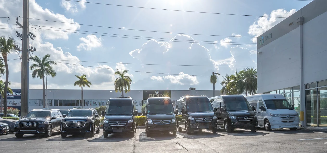 Aura Palm Sprinter vans lined up outside the company depot in South Florida