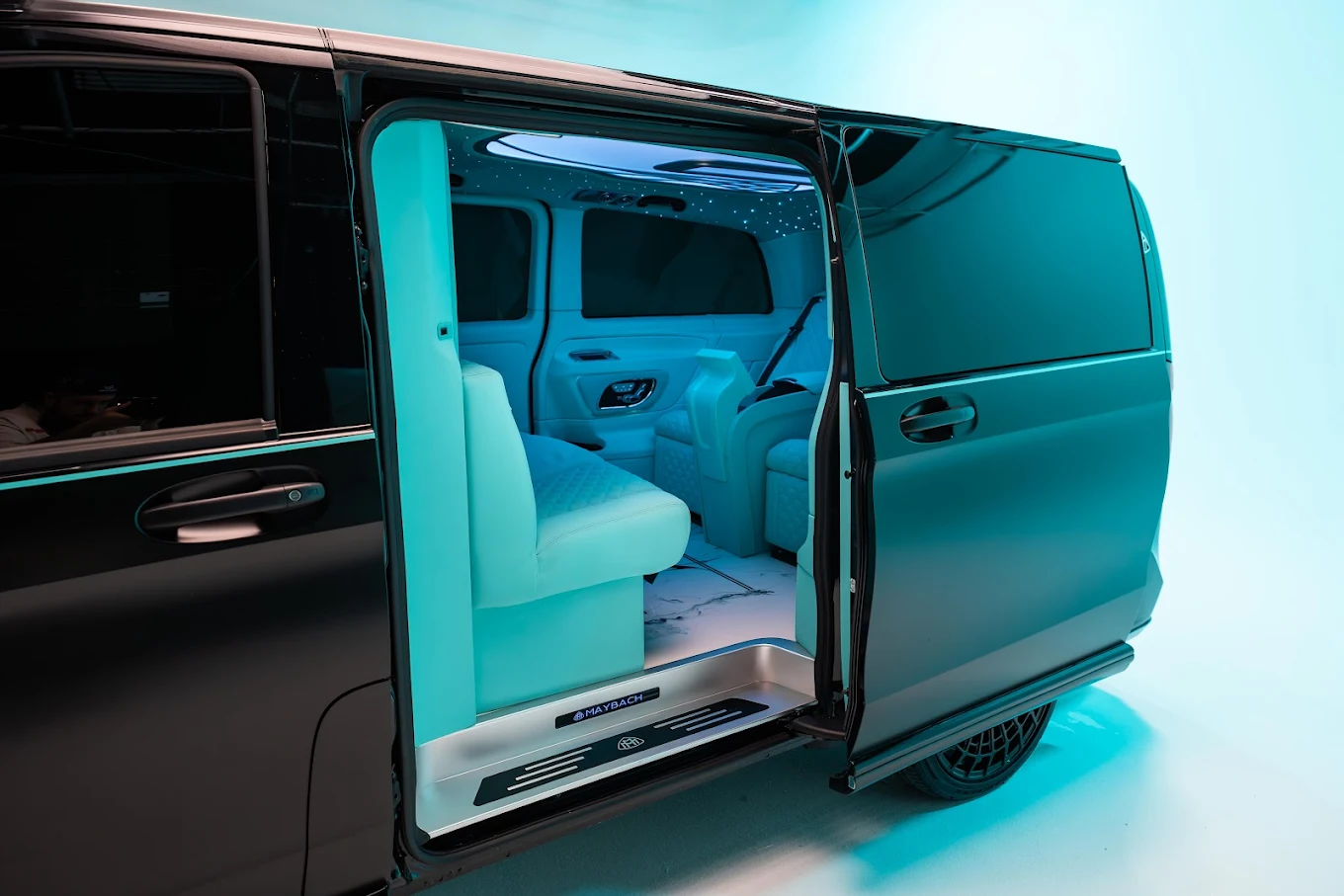 An Aura Palm Sprinter with its door open, ready to receive arriving passengers in South Florida
